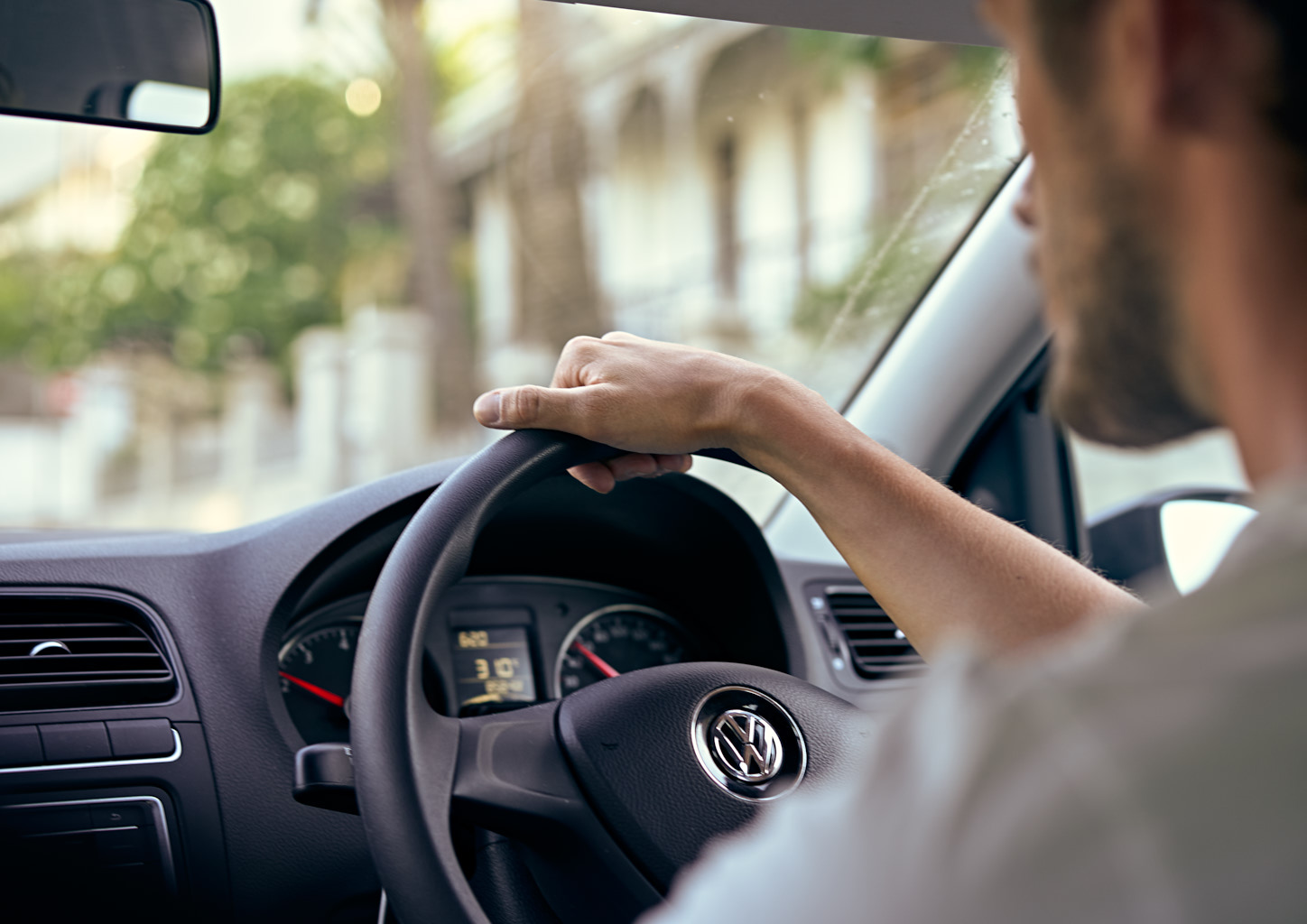 Man, age 30, driving a VW car.